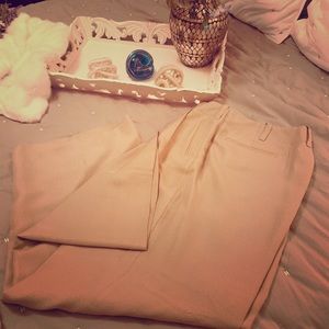 Tan pleated capri dress pants with lining.